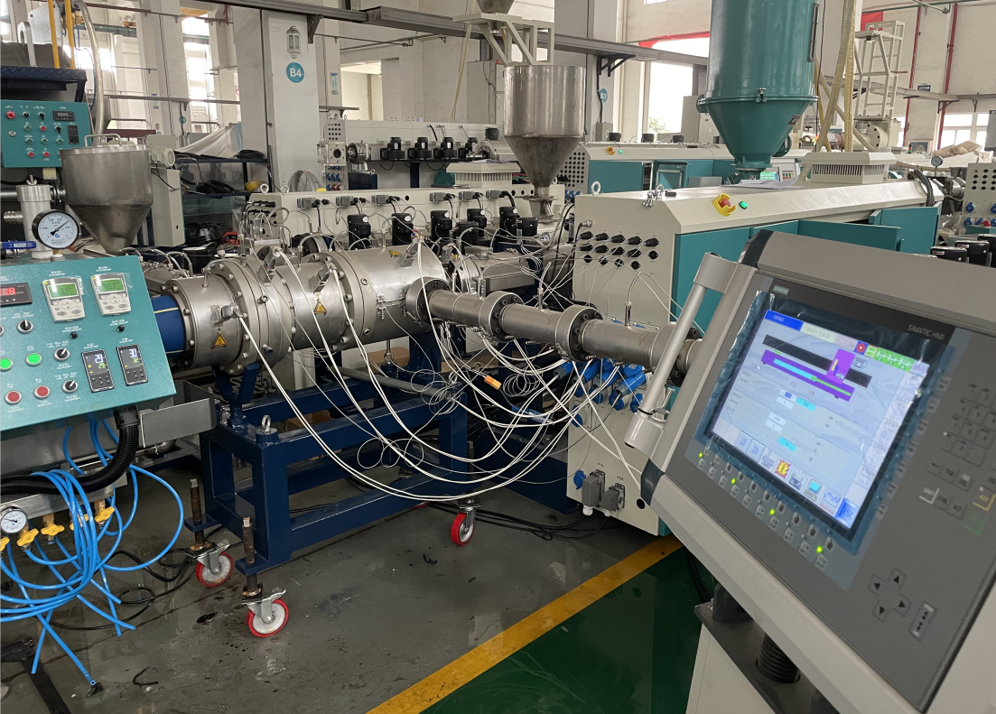 Remédier à la perte de vide dans les lignes de production de tuyaux de co-extrusion à trois couches en PE